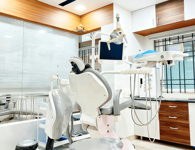 Confident woman smiling naturally after dental treatment at Perfect Dental Studio BTM Layout